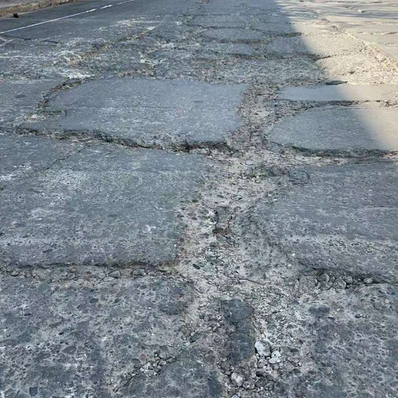 句容路面起砂露石子修补料